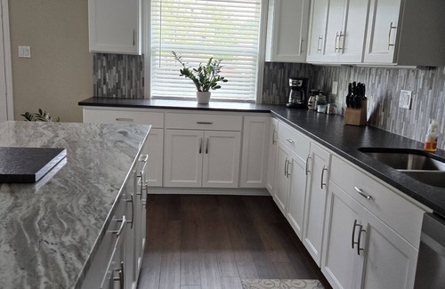 Bryan House | "Colonel".n Spacious open concept. Fresh fun and comfortable for all.