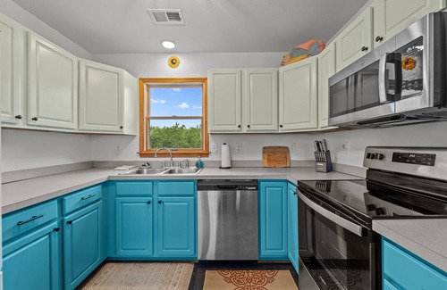 Carova Beach House | Colorful Carova Beach Oasis. Pet friendly with a Pool! 4x4