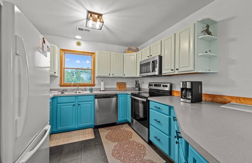 Carova Beach House | Colorful Carova Beach Oasis. Pet friendly with a Pool! 4x4