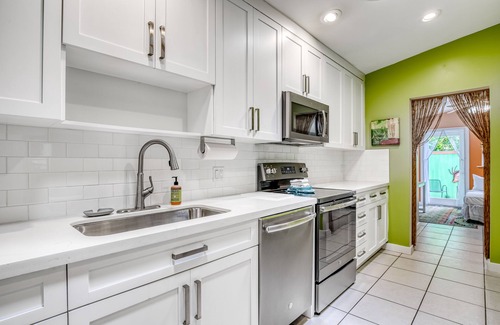 Historic Seaport Cottage | Colorful cottage w/shared pool, central AC, washer/dryer