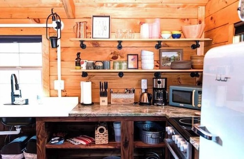 Lupton City Cabin | Colorful Log Cabin w Private Trails and Firepits