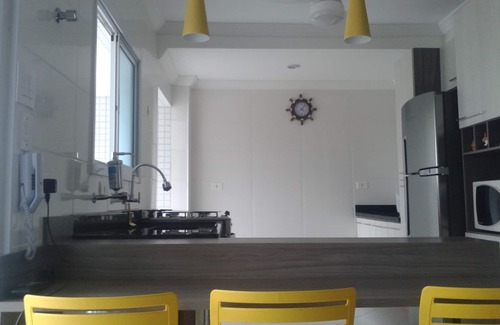 Praia Grande Condo | Come and live days of leisure and rest.
