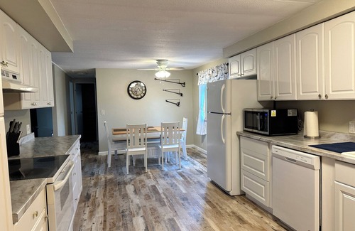 Wilbur House | Come for the Sun, Stay for the Fun in this charming 3 Bedroom Porch Home