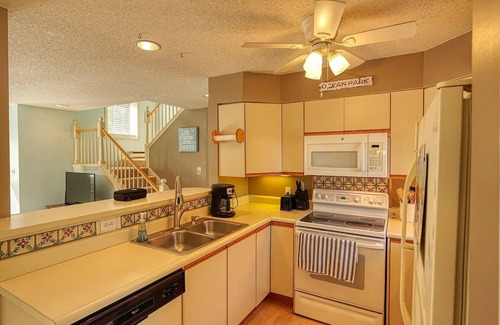 Ocean Park Condo | Come relax on the deck and soak on the ocean breeze or enjoy all that Ocean Park Meadows offers!