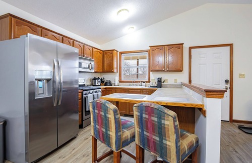 Akron House | Comfort Awaits at Cozy Get Away - Dog Friendly - 3BD/2BA + Living Spaces