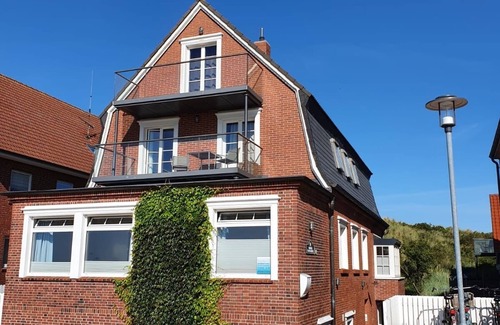 Juist Apartment | Comfort vacation apartment with south-facing balcony and unique view of the mudflats