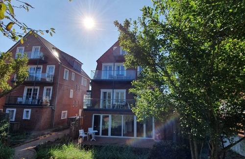 Juist Apartment | Comfort vacation apartment with south-facing balcony and unique view of the mudflats