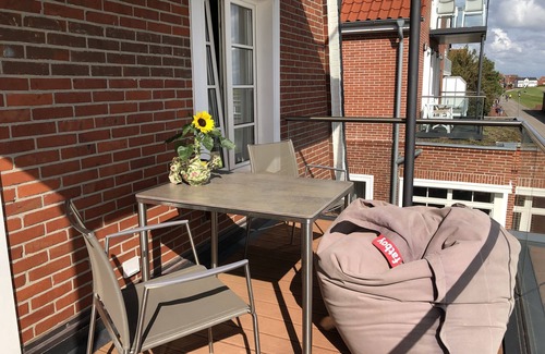 Juist Apartment | Comfort vacation apartment with south-facing balcony and unique view of the mudflats