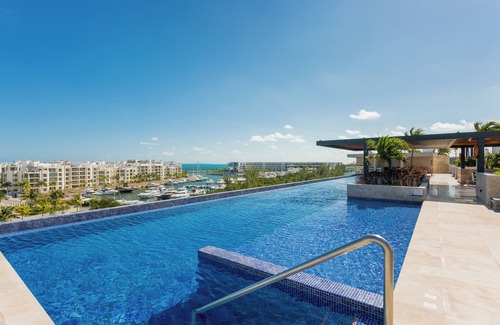 Playa Mujeres Condo | Comfortable 2-Bedroom Condo with AC and Direct Beach Club Entry