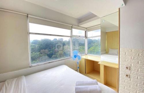Cipaganti Apartment | Comfortable 2BR Apartment AC in Living Room at The Jarrdin Cihampelas By Travelio