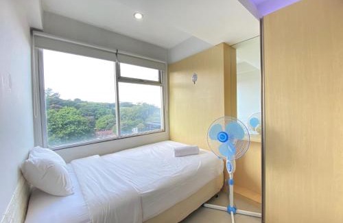 Cipaganti Apartment | Comfortable 2BR Apartment AC in Living Room at The Jarrdin Cihampelas By Travelio