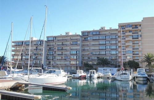 Le Port Apartment | Comfortable 2BR with balcony, private parking near beach