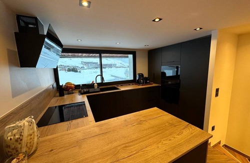 Val Claret Ski Chalet | Comfortable 4* lakeside chalet in the middle of the golf course, ski in, ski out