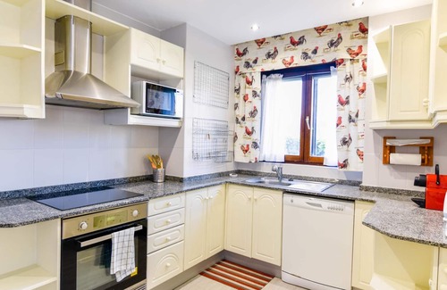 Miengo Villa | Comfortable and spacious villa with communal swimming pool