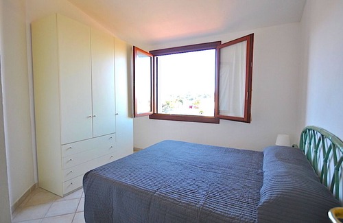 Porto San Paolo House | COMFORTABLE APARTMENT WITH VERANDA 500 METERS FROM THE BEACH 50 METERS FROM THE SERVICES