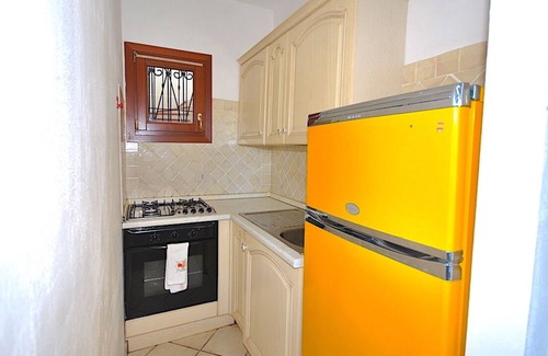 Porto San Paolo House | COMFORTABLE APARTMENT WITH VERANDA 500 METERS FROM THE BEACH 50 METERS FROM THE SERVICES