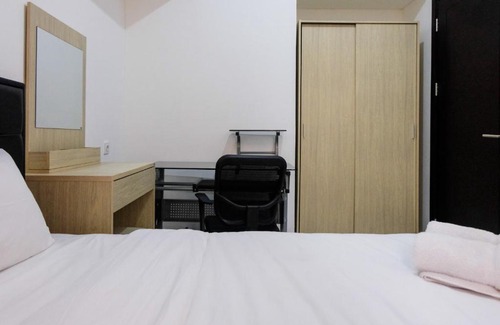 Pagedangan Apartment | Comfy 1BR Casa De Parco Apartment By Travelio