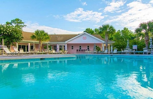 Sunset Beach Condo | Completely Remodeled Luxury Sea Trail Condo on Golf Course. Close to Beach!