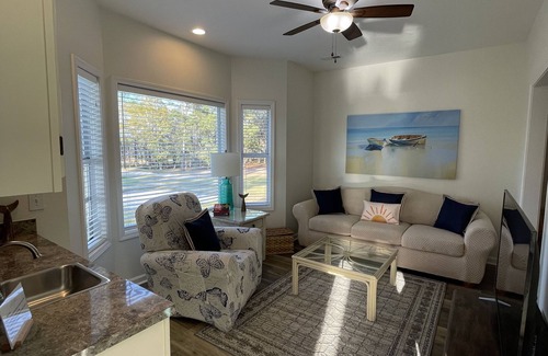 Sunset Beach Condo | Completely Remodeled Luxury Sea Trail Condo on Golf Course. Close to Beach!