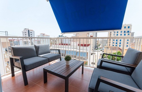 Grao de Gandia Apartment | Condo with charm, a few meters from the beach. A/C and free wifi. Terrace with sea views