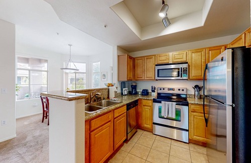 Portofino Condo | Condo with on-site pool, clubhouse, movie theater, & pedestrian paths