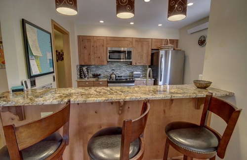 Mountain House Condo | Condo with private laundry & pool & hot tub onsite