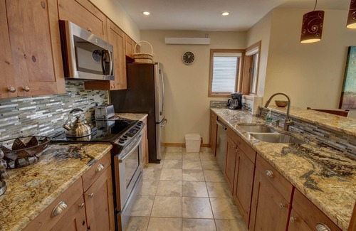 Mountain House Condo | Condo with private laundry & pool & hot tub onsite