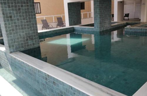 Caicara Apartment | condominio clube com piscina climatizada com fechamento em vidro - Vila Caiçara - Praia Grande 4 adultos e 1 criança até 12 anos