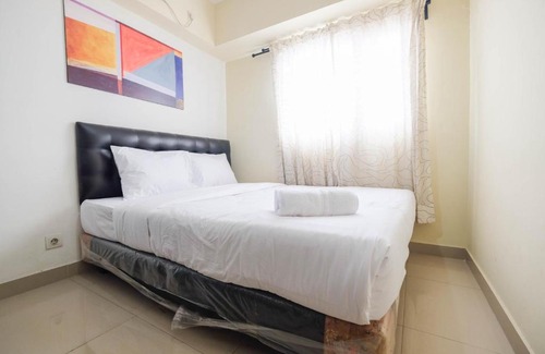 Karet Apartment | Contemporary 2BR at The Wave Apartment By Travelio