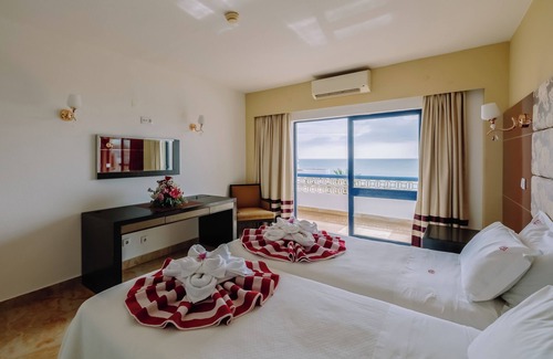 Oura Hotel | Convenient Stay in Oura Beach! 2 Modern Units with Full Kitchens and Balcony!