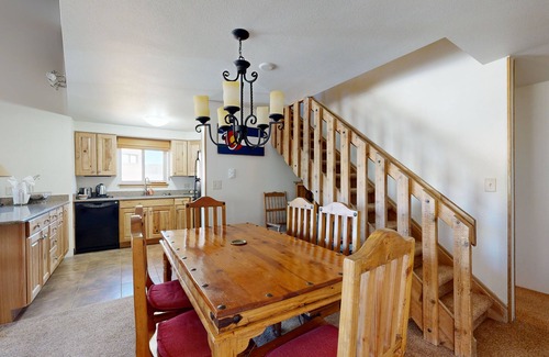 Four O'Clock Condo | Conveniently located condo with fireplace & shared hot tub