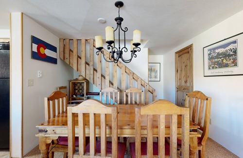 Four O'Clock Condo | Conveniently located condo with fireplace & shared hot tub