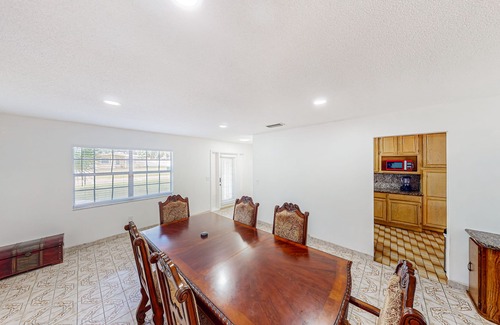 Orient Park House | Conveniently located home with private pool, patio, foosball, & private W/D