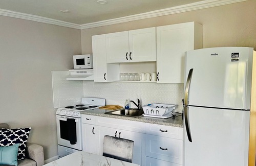 Williams Town Hotel | Coral Beach Hotel and Condominiums