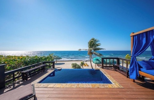 First Bight House | Coral Beach Retreat – Private Beachfront Escape