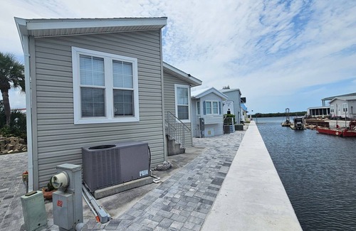 Nettles Island Cottage | Coral Cabana, 166 Nettles - Dockside Beauty!
