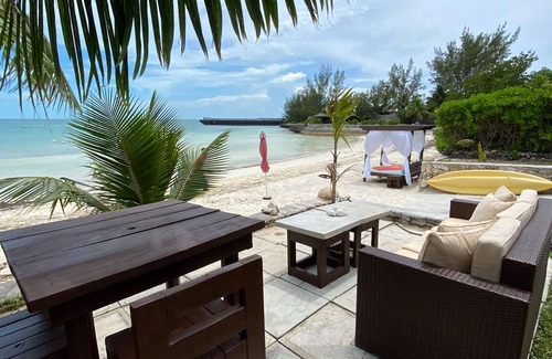 Spanish Wells Cottage | Coral Cove sleeps 2 adults 1 child FREE 4 seater golf cart and 1 kayak 1 sup