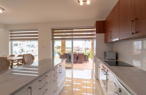 Peyia Town Villa | Coral Elite Residence 9. Luxury 4 bedroom villa with private pool and jacuzzi.