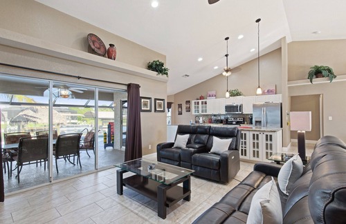 Burnt Store House | Coral Paradise - 4/2 Gulf Access Home with Electric Heated Pool, Game Room, Kayaks, Tiki Hut