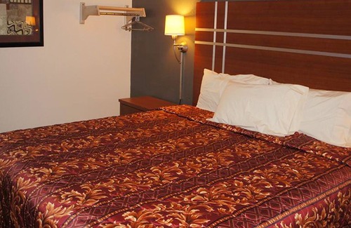 Waite Park House | Coratel Inn & Suites By Jasper Waite Park- 1 King Bed Non-Smoking