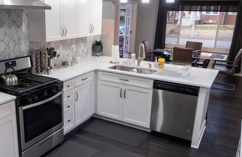 Evansville House | Corner Bungalow: Newly Renovated, Spacious & Open, Central & Convenient.