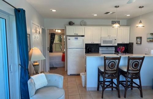 Wheeland Settlement Condo | Corner Ground Floor Oceanfront/Stunning Ocean Views & Easy Beach Access.