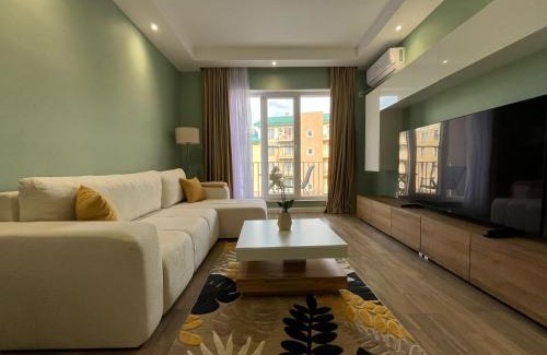 Stefanestii de Jos Apartment | Cosmopolis Family Apartment - Pools & Gym