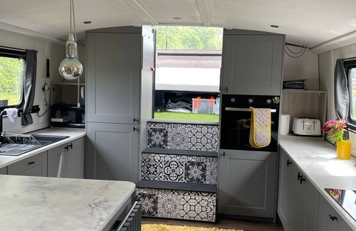 Langold Boat Rental | Cosy 70ft wide beam barge on the river! Completely off grid living!