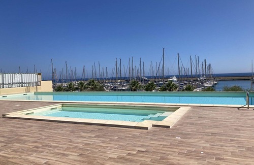 Santo Stefano al Mare Apartment | Cosy apartment for 4 guests with WIFI, A/C, terrace, pets allowed and parking