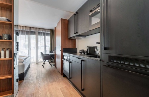 Kirchberg in Tirol Apartment | Cosy apartment for 4 guests with WIFI, pool, TV and terrace