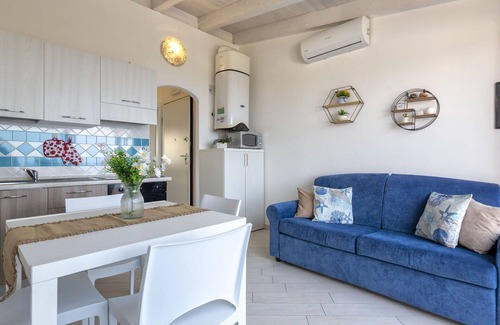 Paduledda Apartment | Cosy apartment for 4 people with A/C, pool, TV, terrace and pets allowed