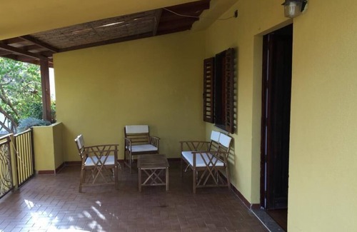 Torre di Bari Apartment | Cosy Apartment “Casa Sa Marina” Close to Beach with Terrace & Garden; Parking Available, Pets Allowed