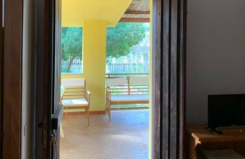 Torre di Bari Apartment | Cosy Apartment “Casa Sa Marina” Close to Beach with Terrace & Garden; Parking Available, Pets Allowed
