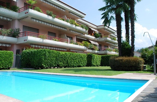 Caslano Apartment | Cosy apartment for 4 guests with WIFI, pool, TV, patio and pets allowed